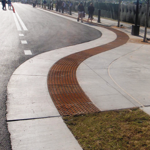 Detectable Waring Plate on a Sidewalk